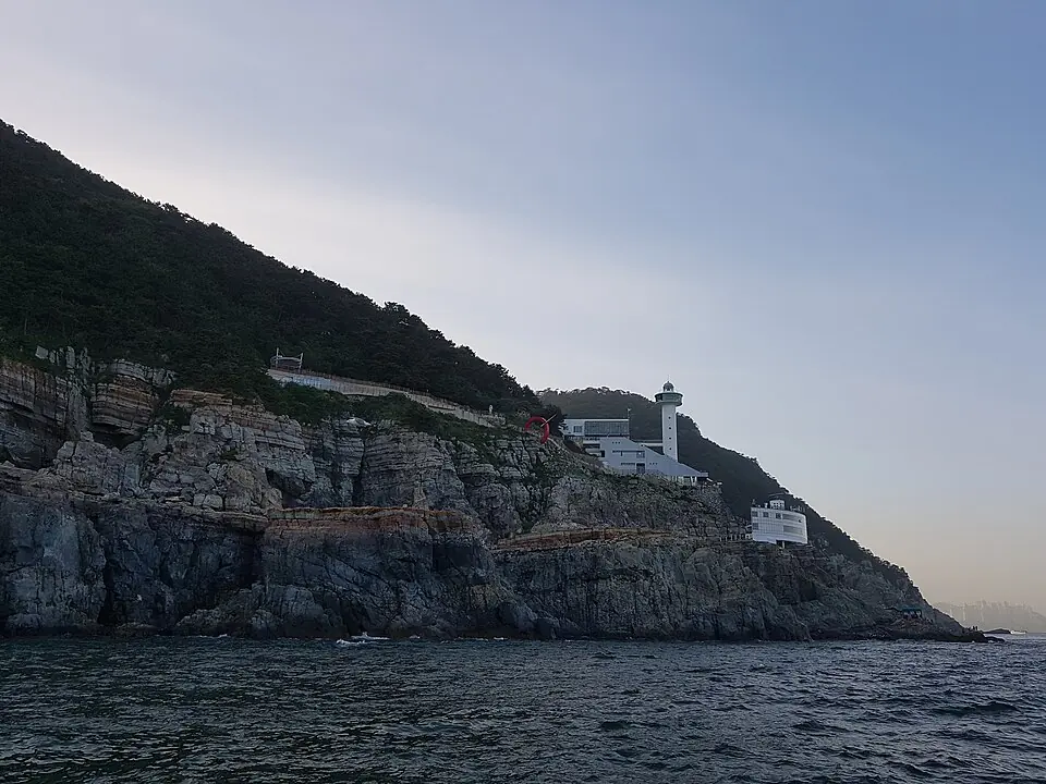 Taejongdae cliffs and Yeongdo lighthouse viewed from the sea